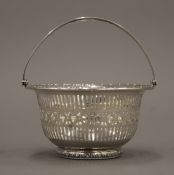 A small sterling silver basket. 9.5 cm diameter. 2.2 troy ounces.