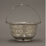 A small sterling silver basket. 9.5 cm diameter. 2.2 troy ounces.