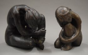 Two resin models of nude women. The largest 17 cm high.