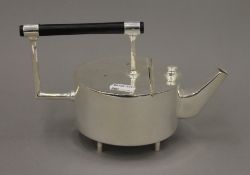 A Christopher Dresser style tea pot. 12 cm high.
