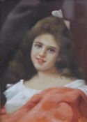 An early 20th century oil on panel, A Portrait of a Young Girl, framed and glazed. 12 x 17 cm.