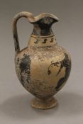 An antiquity type pottery ewer. 14.5 cm high.