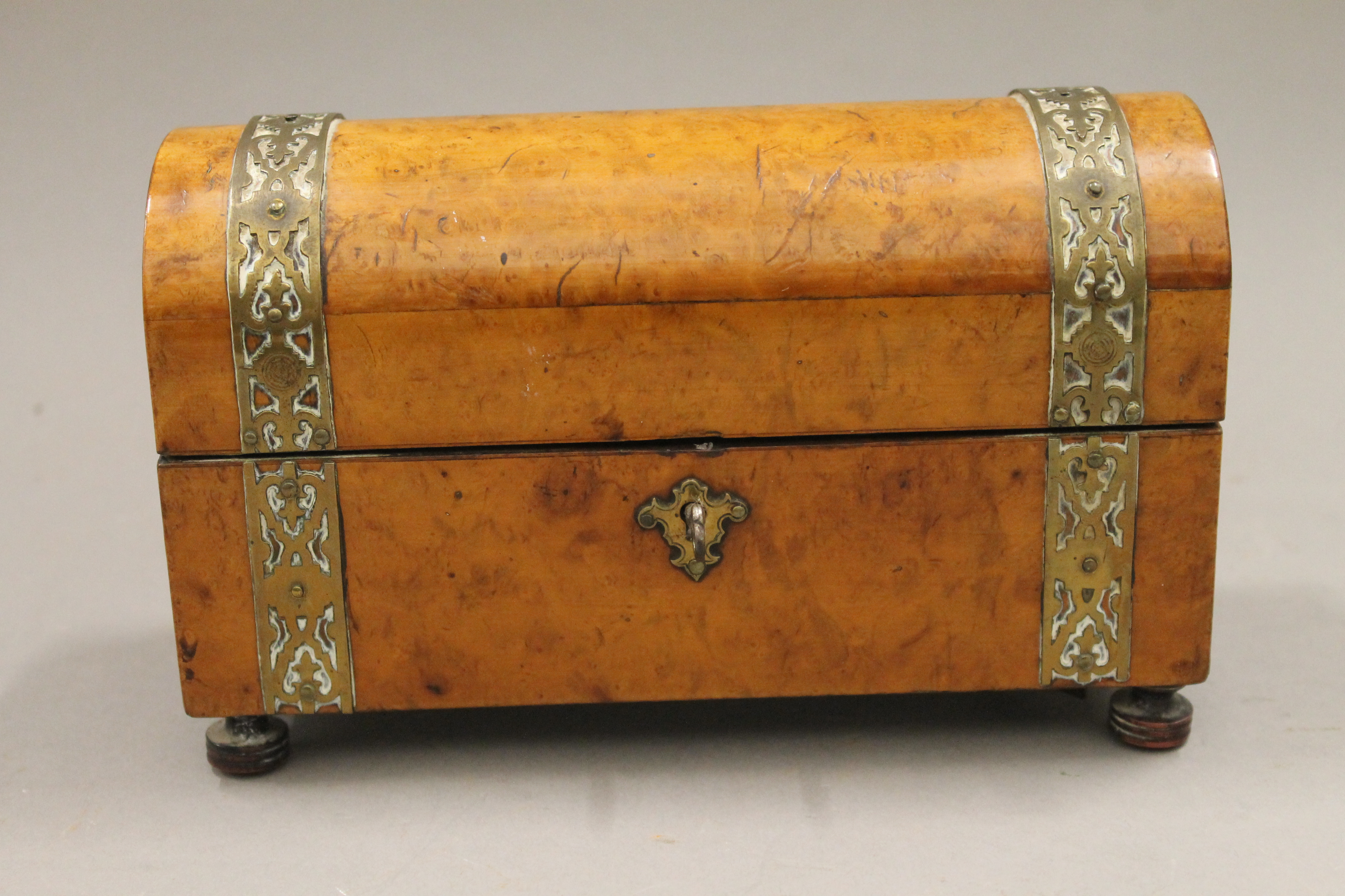 A Victorian brass bound burr walnut musical jewellery box. 19 cm long.