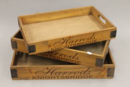 A set of three trays. The largest 56 cm long.