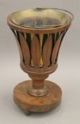 A 19th century mahogany log bucket with brass liner. 53.5 cm high.