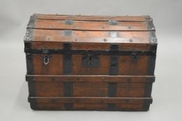 A Victorian dome top iron bound trunk. 75.5 cm wide.