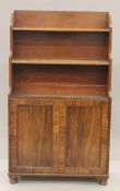 An early 19th century mahogany waterfall bookcase. 80.5 cm wide.