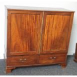 A 19th century mahogany linen press. 127 cm wide.