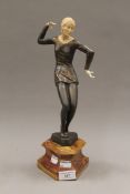 An Art Deco style figure of a dancing lady. 35.5 cm high.