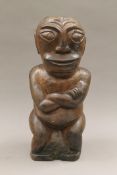 A Polynesian tribal carved wooden figure. 32 cm high.