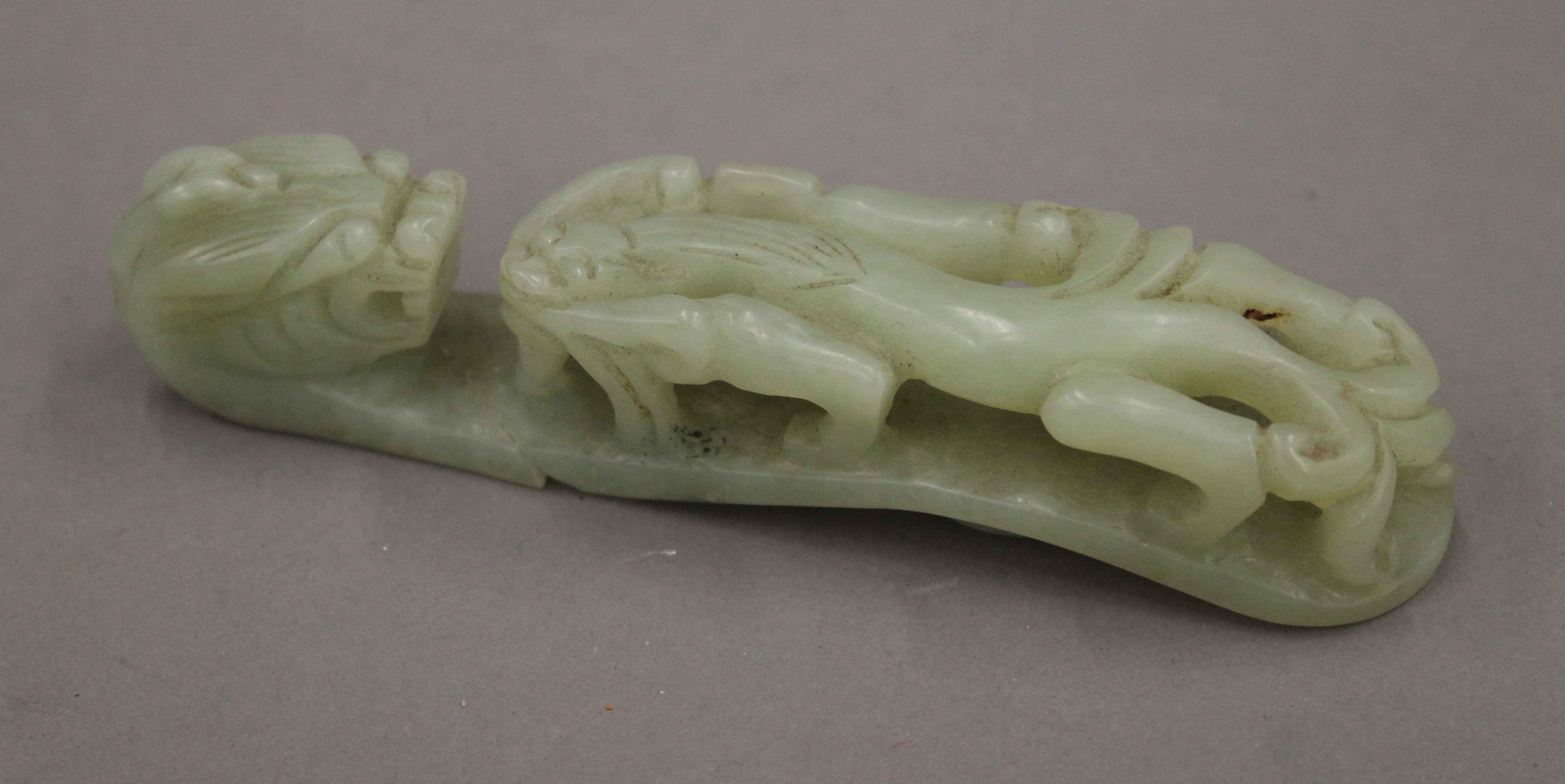 A Chinese jade belt hook. 12.5 cm long. - Image 2 of 3