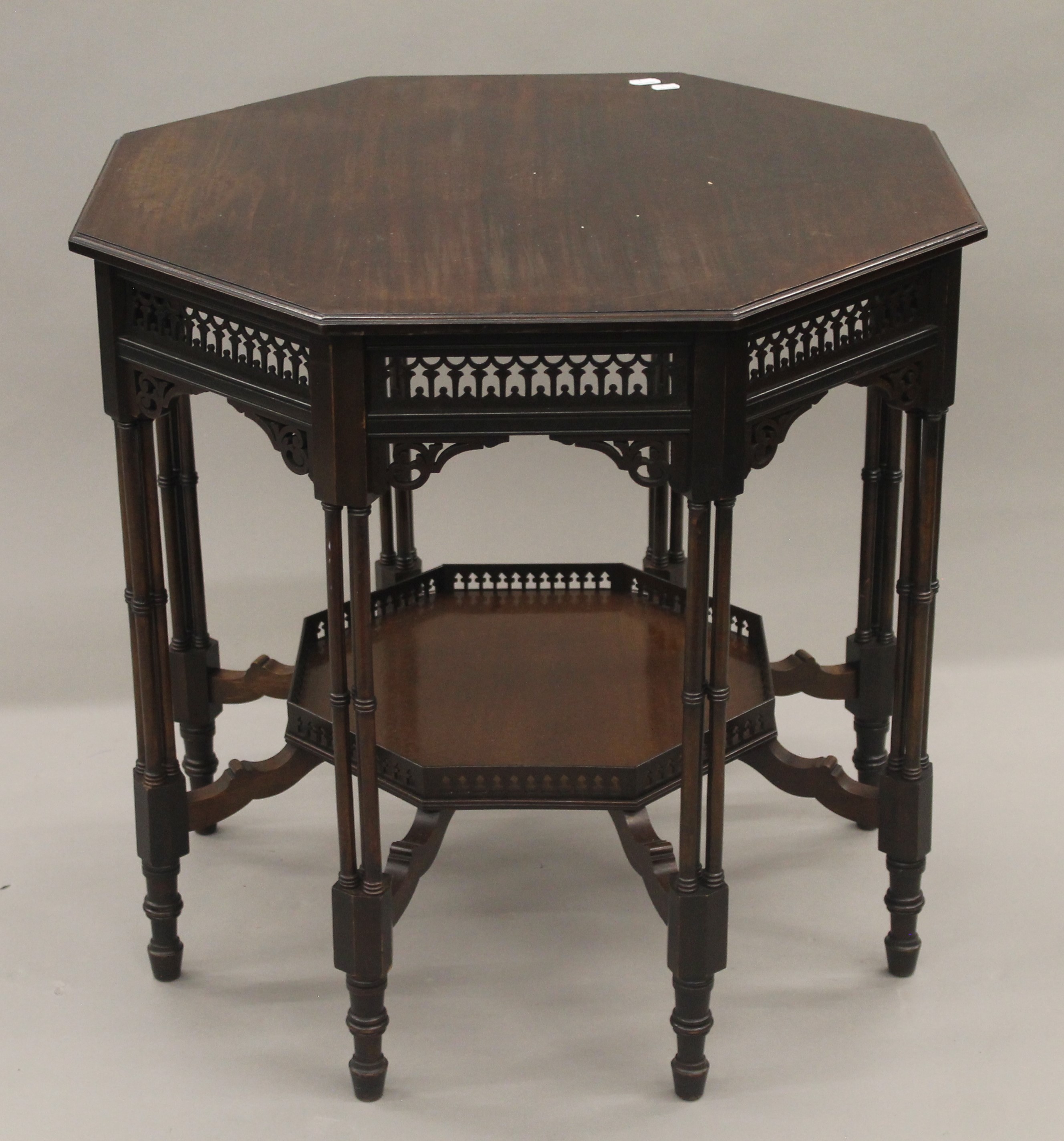 An Edwardian mahogany octagonal centre table. 70 cm wide.