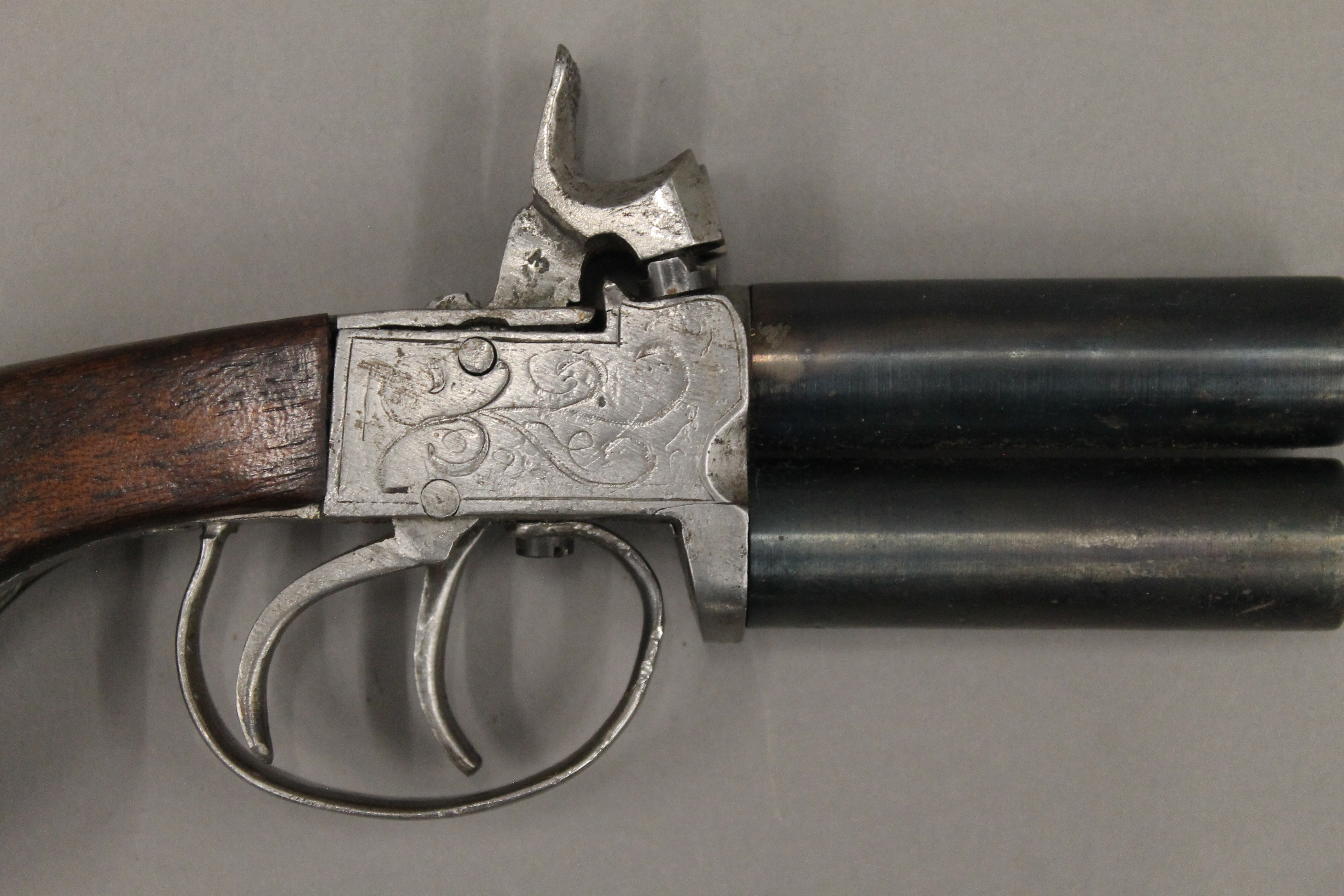A 19th century percussion over and under pistol. 17 cm long. - Image 2 of 4