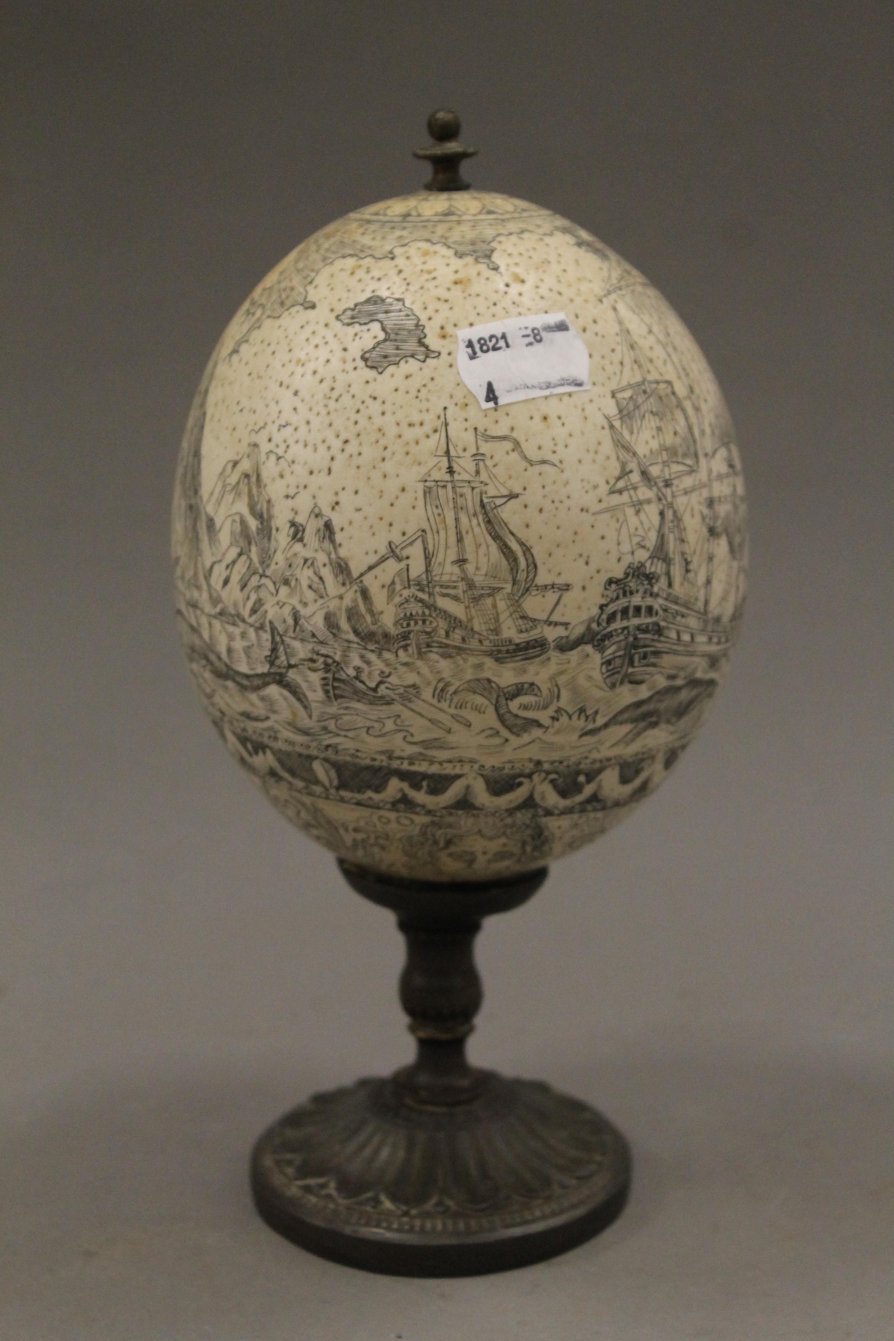 A carved and mounted ostrich egg. 23 cm high. - Image 3 of 5