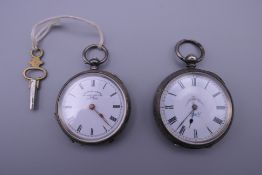 Two silver fob watches.