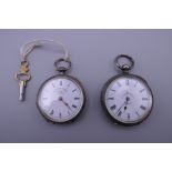Two silver fob watches.