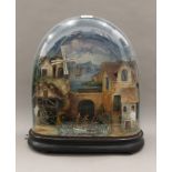 An antique automaton under dome with moving windmill, watermill steam train and rocking boat,