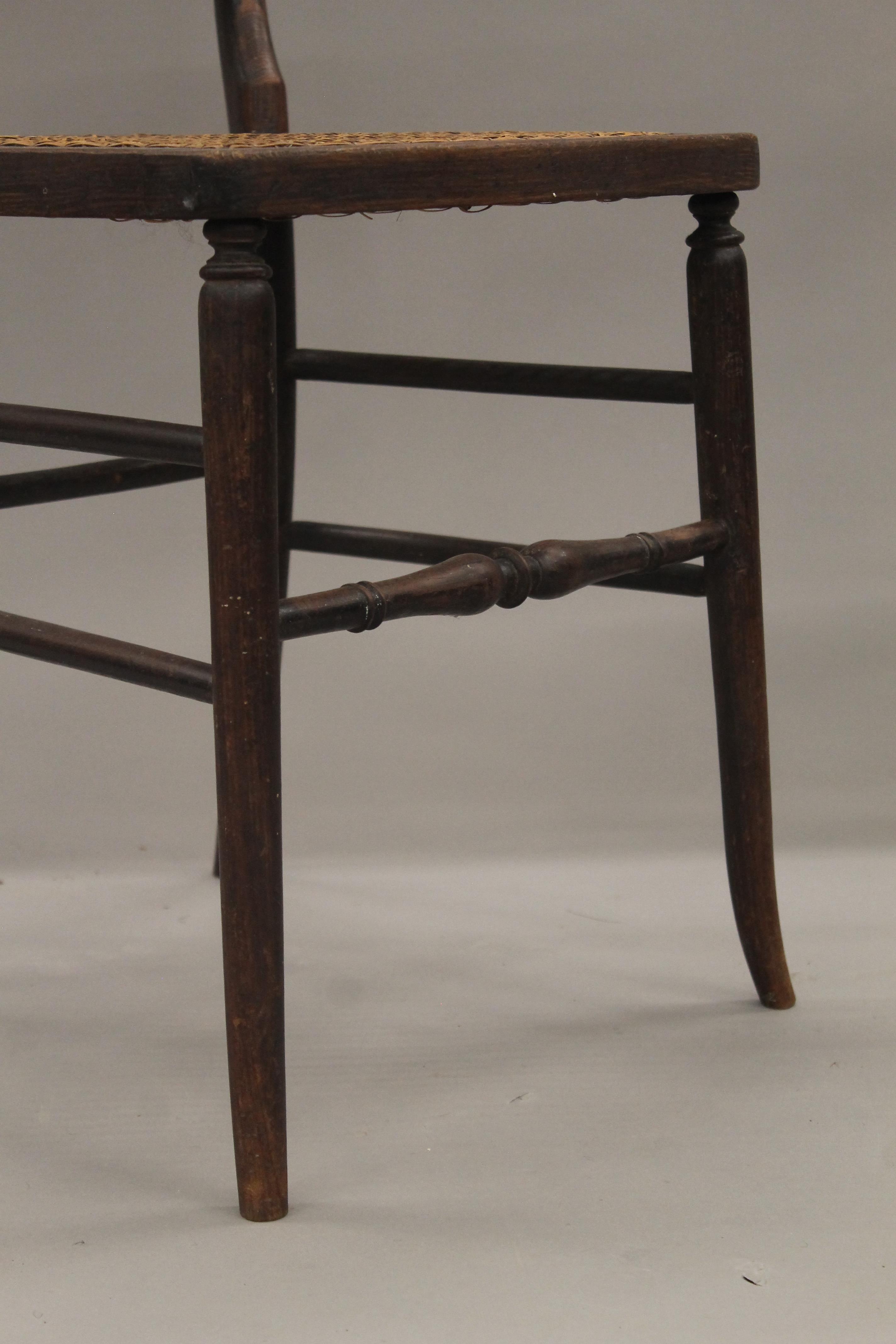 A pair of early 19th century faux rosewood cane seated chairs. 35.5 cm wide. - Image 4 of 5