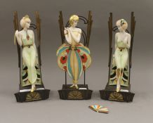 Three Albany Fine China Art Deco figurines. Each approximately 28 cm high.