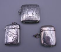 Three silver vestas. The largest 5 cm wide. 84.7 grammes.