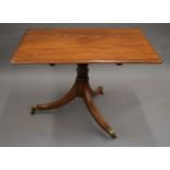 A 19th century mahogany tilt top breakfast table. The top 116 x 89 cm.