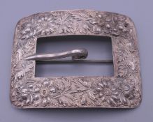 A silver buckle brooch. 8 cm wide. 42.3 grammes.