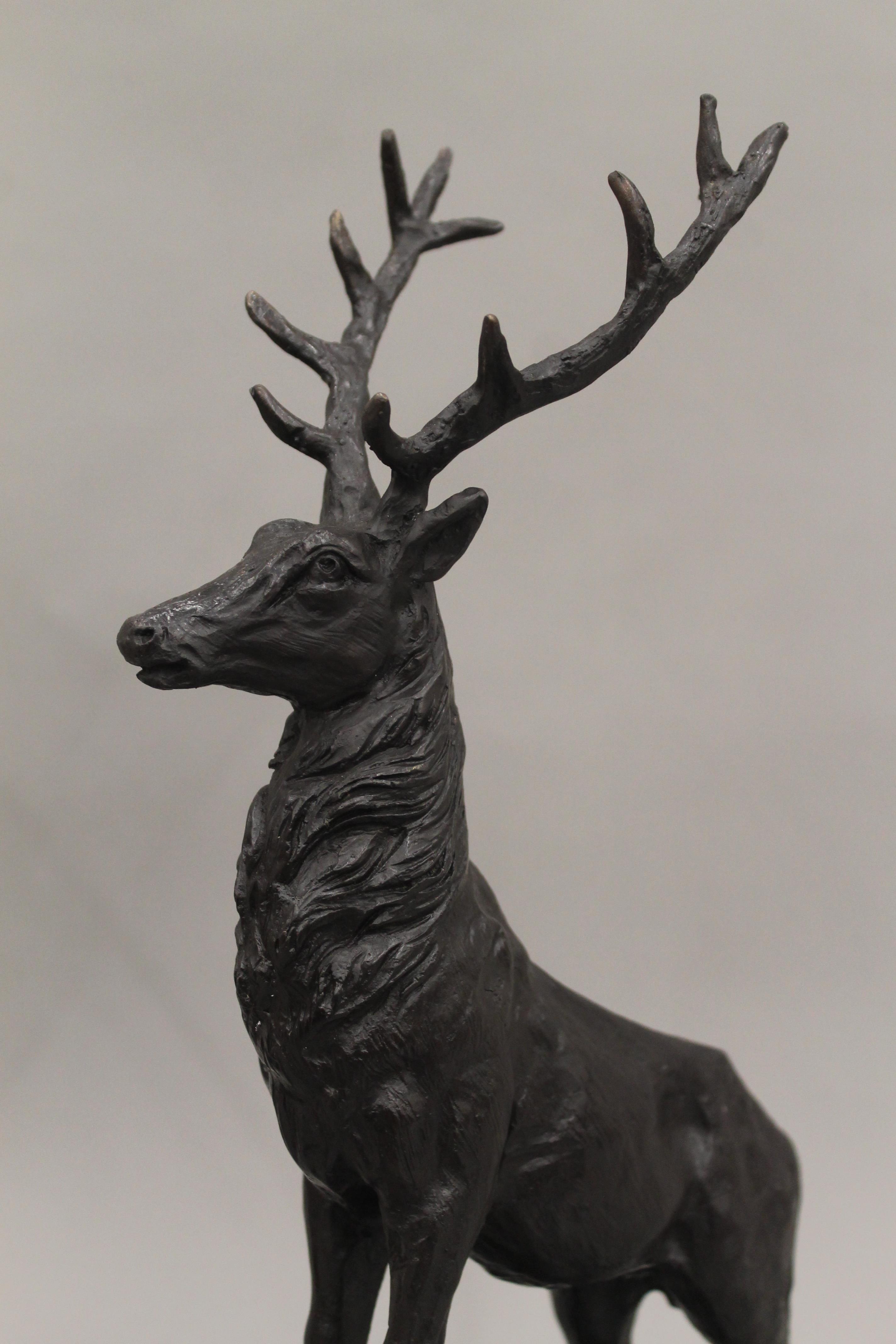 A pair of bronze stags. 42.5 cm high. - Image 4 of 4