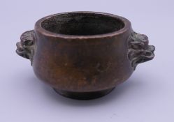 A small Chinese bronze censer. 3.25 cm high.