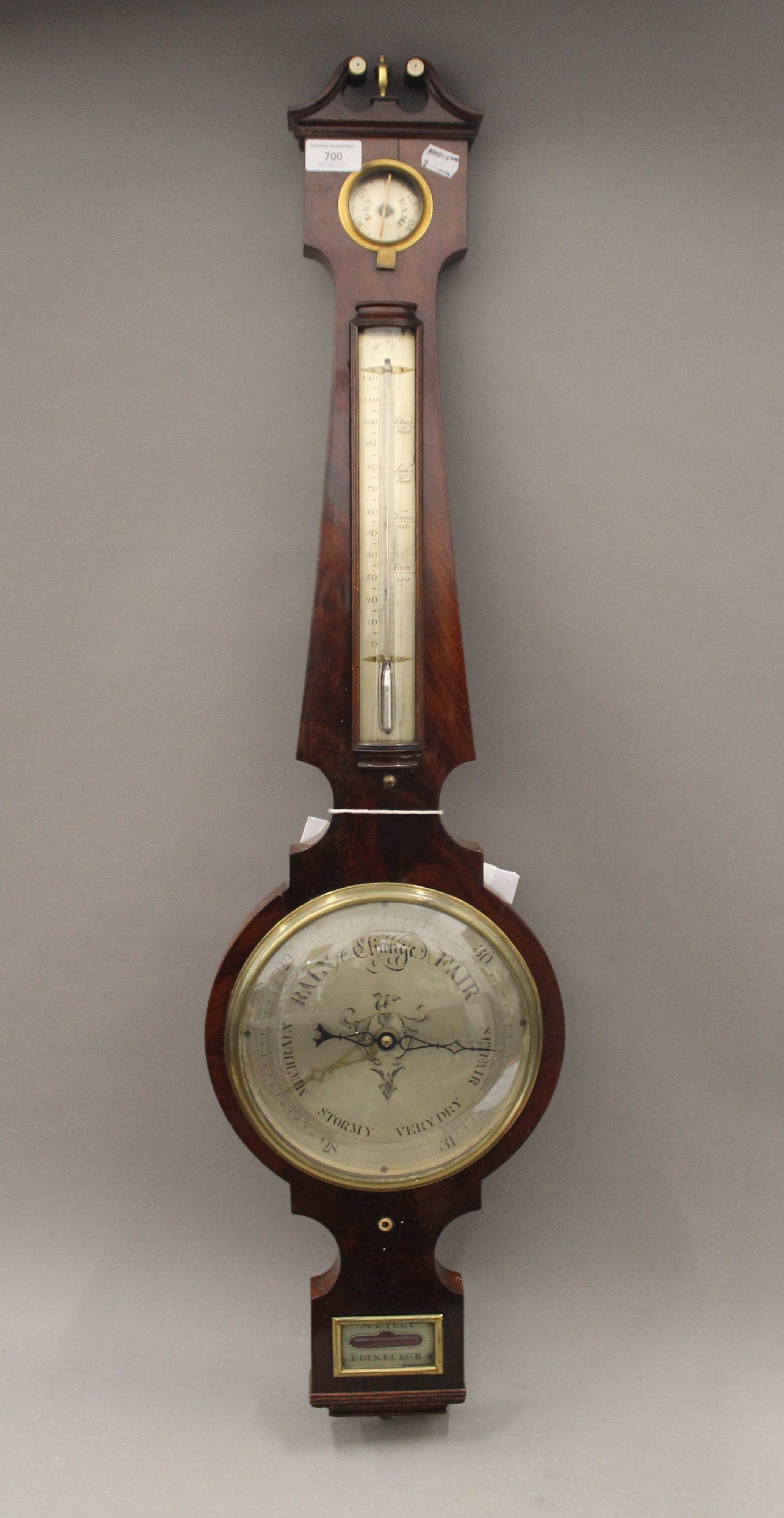 A 19th century mahogany banjo barometer. 100 cm high.