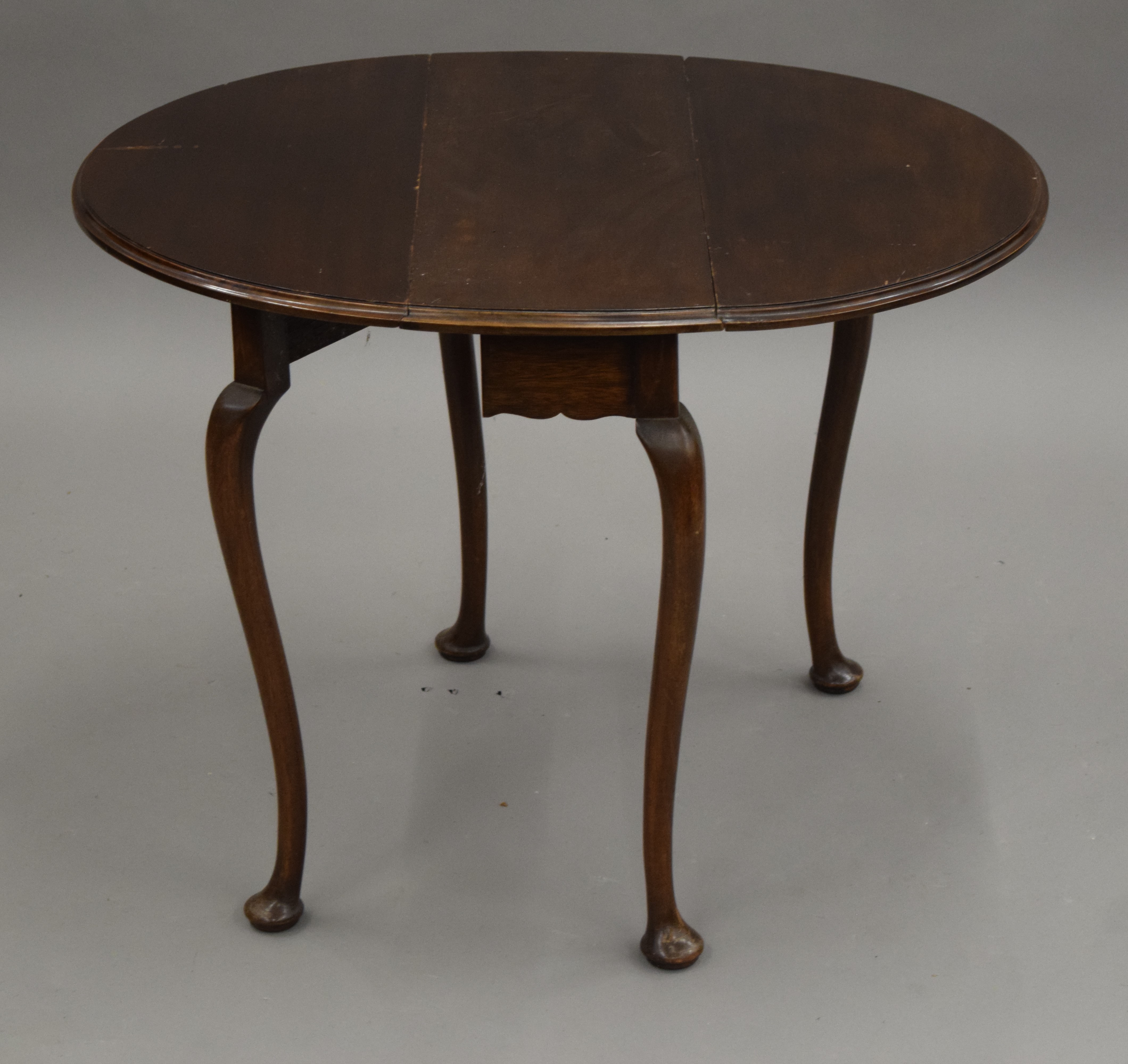 A small early 20th century mahogany drop leaf table. 59.5 cm long. - Image 2 of 5