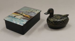 A Russian papier mache box and a Chinese papier mache box formed as a duck. The former 8.75 cm wide.