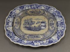 Two blue and white porcelain meat plates. The largest 45 cm wide.