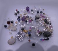 A quantity of gemstones, including diamonds, sapphires, etc.