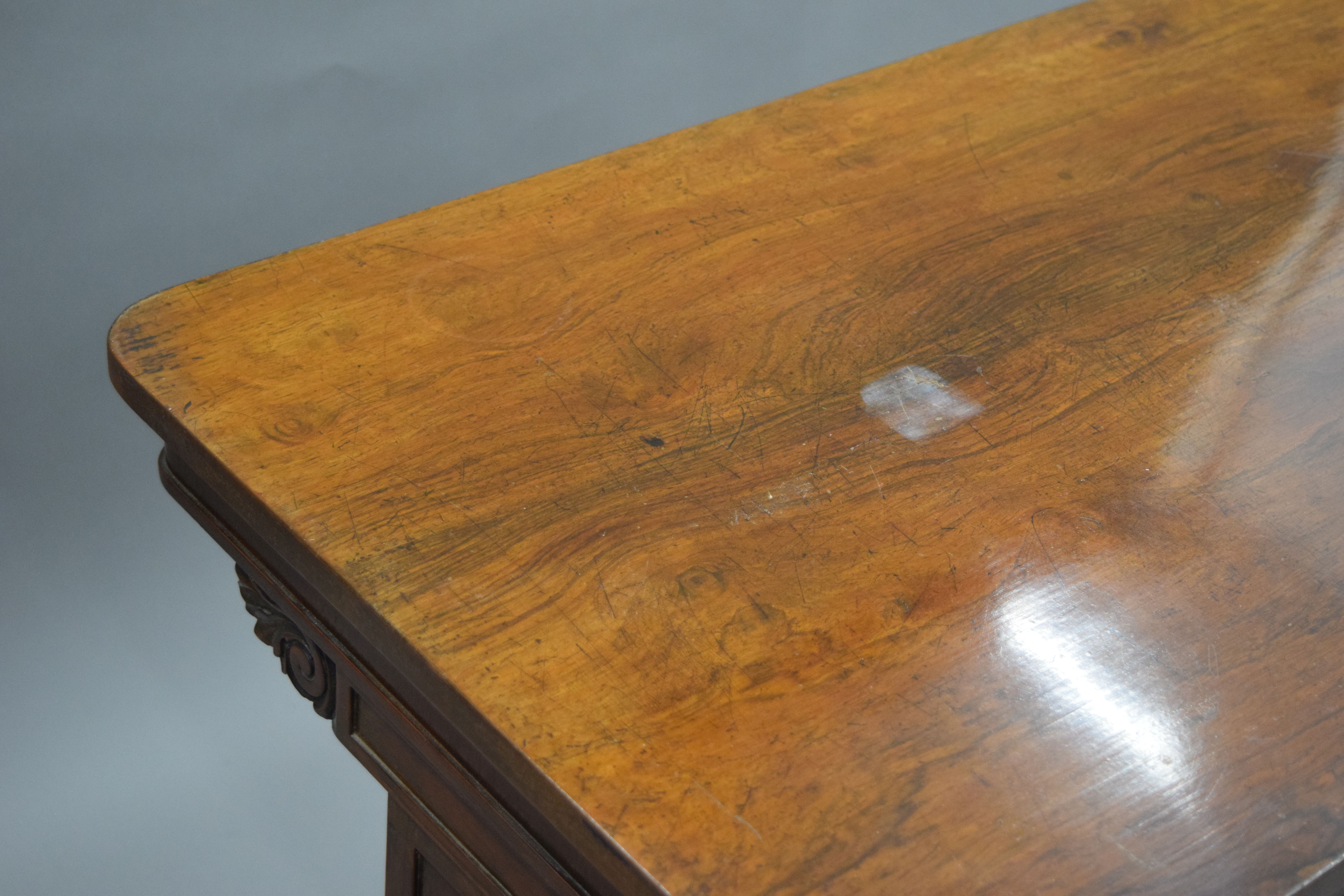 A 19th century rosewood centre table. 99 cm long. - Image 5 of 6