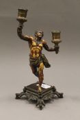 A bronze figural candlestick. 25.5 cm high.