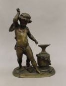 A 19th century bronze model of a cherub and anvil. 25.5 cm high.