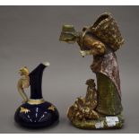 An amphora porcelain figure and a porcelain ewer. The former 34.5 cm high.