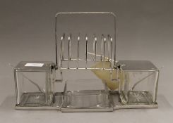 An Asprey and Co silver plated breakfast set.