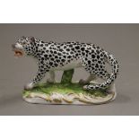 An early porcelain model of a leopard. 10.5 cm long.