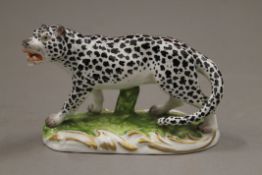 An early porcelain model of a leopard. 10.5 cm long.