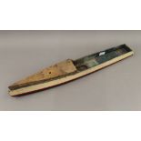 An early 20th century wooden model of a boat hull. 75 cm long.