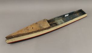 An early 20th century wooden model of a boat hull. 75 cm long.