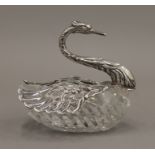 A silver mounted and cut-glass swan form vase. 13 cm long.