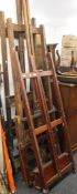 Three large easels. Approximately 250 cm tall when folded.