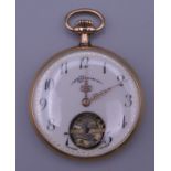 An 18 ct gold half hunter pocket watch. 4.75 cm diameter. 48.4 grammes total weight.