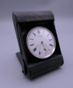 A silver Kendal and Dent, London pocket watch in case. 5 cm diameter.