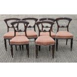 A set of six Victorian mahogany dining chairs.