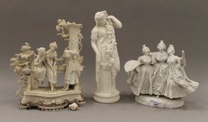 Three 19th century bisque porcelain figures. The largest 26 cm high.