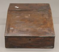 A 19th century mahogany clerk's desk. 54 cm wide.