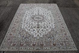 A signed Kashan carpet. 345 x 250 cm.